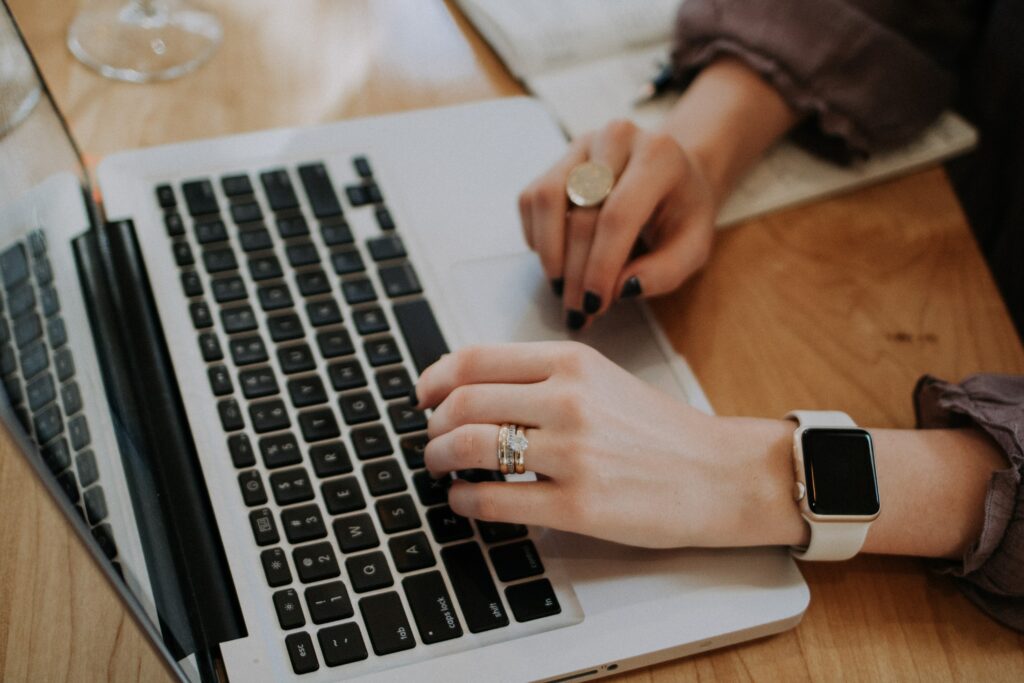 woman typing at computer
